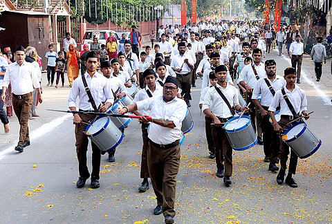 Rashtriya Swayamsevak Sangh (RSS) volunteers take part in a 'Path Sanchalan' procession in Goverdhan town, near Mathura, Uttar Pradesh.