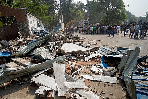 Debris scattered around after Municipal Corporation carried out a demolition drive of lawyers' chambers allegedly built illegally, following a High Court order, in Lucknow, Sunday, Oct. 25, 2026. 
