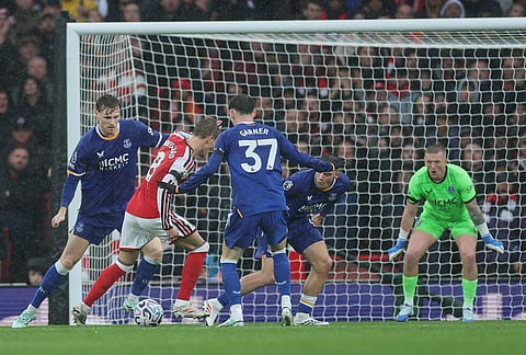 Arsenal's Martin Odegaard is srrounded by Everton players during the English Premier League soccer match between Arsenal and Everton in London, Saturday, Oct. 24, 2026.