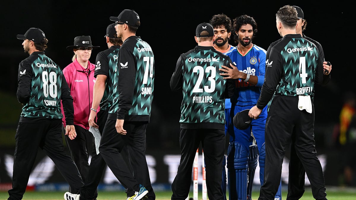 India's Tilak Varma, third right, shakes hands with New Zealand's players after winning the second T20 cricket international between New Zealand and India in Christchurch, New Zealand, Saturday, Oct. 24, 2026 - (Chris Symes/Photosport via AP)