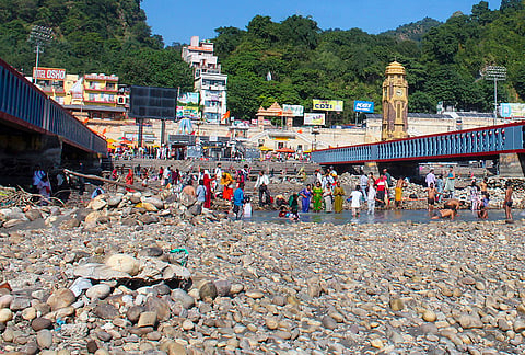 People gather at the banks of Har Ki Pauri, in Haridwar, Thursday, Oct. 22, 2026. 