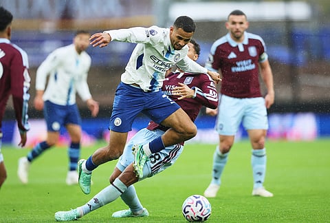 Manchester City's Iliman Ndiaye challenges for the ball with Aston Villa's Boubacar Kamara, centre right, during the English Premier League soccer match between Aston Villa and Manchester City in Birmingham, England, Saturday, Oct. 24, 2026. 