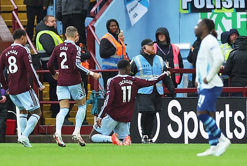 Aston Villa's Nicolas Jackson, centre, celebrates after scoring his side's second goal during the English Premier League soccer match between Aston Villa and Manchester City in Birmingham, England, Saturday, Oct. 24, 2026. 