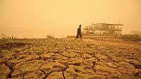 In Photos: Thick Haze Covers Cities After Wildfire In Indonesia | Photo: AP/Yulianus Stefan Lundju : A man walks amid thick haze from wildfires in Palangkaraya, Central Kalimantan, Indonesia, Saturday, Oct. 24, 2026.