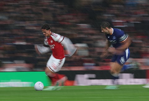 Everton's James Tarkowski follows Arsenal's Max Downman during the English Premier League soccer match between Arsenal and Everton in London, Saturday, Oct. 24, 2026.