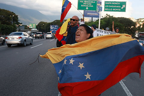 Supporters of Venezuelan opposition leader and Nobel Peace Prize laureate Maria Corina Machado celebrate following her return to the country after months abroad in Caracas, Venezuela, Sunday, Oct. 25, 2026.