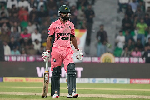 Pakistan's Fakhar Zaman walks off the field after loosing his wicket during the tri-series one-day international cricket match between Pakistan and England, in Lahore, Pakistan, Sunday, Oct. 25, 2026.