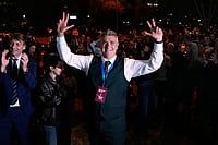 In Photos | Serbia Elections 2026: Belgrade Celebrates as Vucic Concedes Defeat to Student List | Photo: AP/Petr David Josek : Students' List leader Ilija Srdanovic celebrates after Aleksandar Vucic, leader of the right-wing Serbian Progressive Party (SNS) conceded defeat in the parliamentary election in Belgrade, Serbia, Sunday, Oct. 25, 2026.