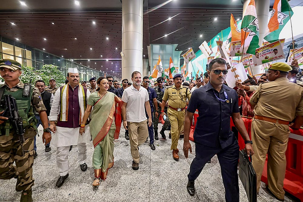 In this image posted on Oct. 26, 2026, LoP in the Lok Sabha Rahul Gandhi being welcomed by Congress leaders and workers, at Lucknow Airport. - | Photo: @INCIndia/X via PTI 