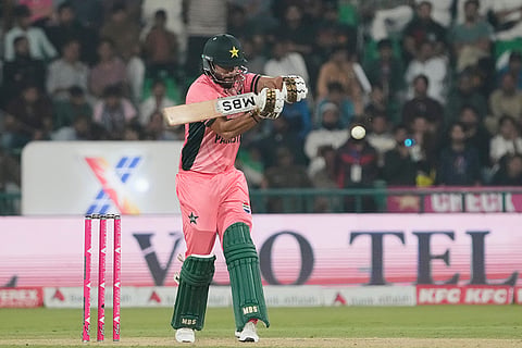 Pakistan's Salman Ali Agha plays a shot during the tri-series one-day international cricket match between Pakistan and England, in Lahore, Pakistan, Sunday, Oct. 25, 2026.