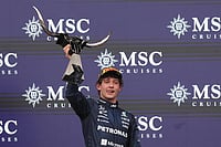 | Photo: AP/Eric Gay : Mercedes driver Andrea Kimi Antonelli of Italy celebrates on the podium after winning the Formula One U.S. Grand Prix auto race in Austin, Texas, Sunday, Oct. 25, 2026.
