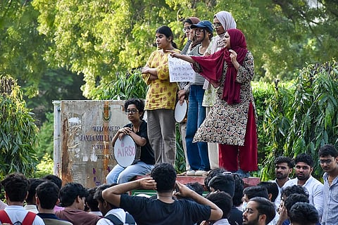 Students stage a demonstration outside the Jamia Millia Islamia University, in New Delhi, Monday, Oct. 26, 2026. Jamia Millia Islamia on Monday ordered that students' union elections be held within 15 days of the approval of the union's constitution and revoked suspension and show-cause notices issued to students during the ongoing protest, according to an official order. 