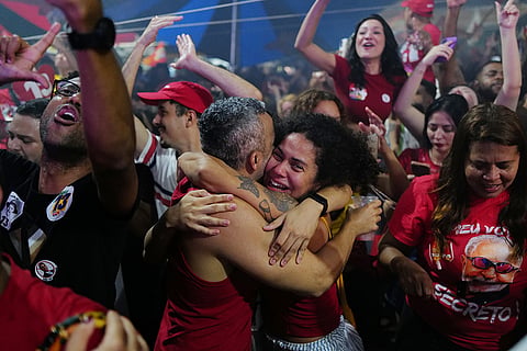 Supporters of President Luiz Inacio Lula da Silva celebrate after he won the presidential runoff in Rio de Janeiro, Sunday, Oct. 25, 2026.