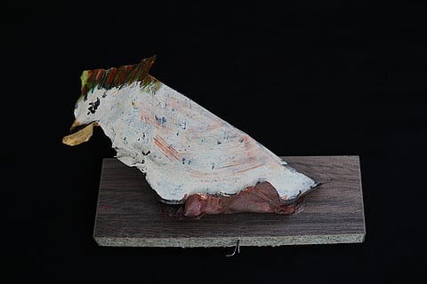 An artwork depicting a bird, created by visual artist Lina Jouni from shrapnel collected from Israeli military munitions, is displayed at her home in the village of Roumin, southern Lebanon, Sunday, Oct. 25, 2026.