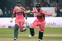 Shadab Khan, Haris Rauf Produce Record Last-Wicket Stand In Thrilling Chase | Photo: AP/K.M. Chaudary : Pakistan's Shadab Khan and Haris Rauf celebrate after winning the tri-series one-day international cricket match against England, in Lahore, Pakistan, Sunday, Oct. 25, 2026.