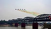 Varanasi Air Show: Man Held For Allegedly Posing As Army Captain Near Helipad PTI : Indian Air Force's Sarang helicopter display team during the 'Wings Over Ganga' air show, to mark the 94th anniversary of IAF, in Varanasi