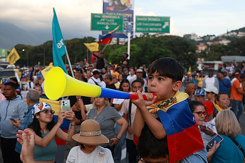 Supporters of Venezuelan opposition leader and Nobel Peace Prize laureate Maria Corina Machado celebrate her return to the country after months abroad in Caracas, Venezuela, Sunday, Oct. 25, 2026.
