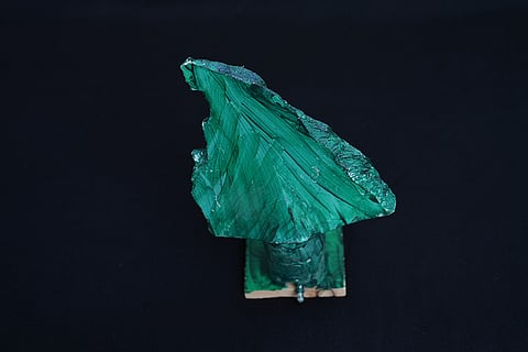 An artwork resembling a cedar tree, created by visual artist Lina Jouni from shrapnel collected from Israeli military munitions, is displayed at her home in the village of Roumin, southern Lebanon, Sunday, Oct. 25, 2026.