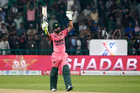 Pakistan's Shadab Khan celebrates after scoring a century during the tri-series one-day international cricket match between Pakistan and England, in Lahore, Pakistan, Sunday, Oct. 25, 2026.