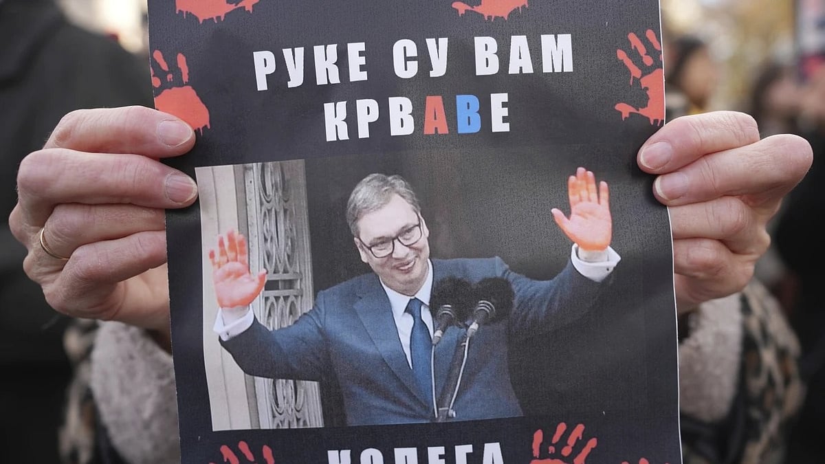 Protestor Holding Banner Against Aleksandar Vučić - AP