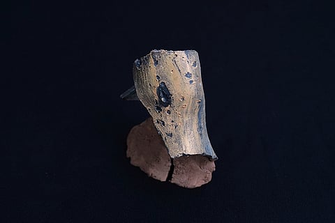 An artwork created by visual artist Lina Jouni from shrapnel collected from Israeli military munitions is displayed at her home in the village of Roumin, southern Lebanon.