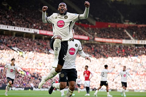Bournemouth's Rayan celebrates scoring his side's first goal during the English Premier League soccer match between Manchester United and Bournemouth in Manchester, England, Sunday, Oct. 25, 2026.