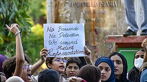 | Photo: PTI/Rushikesh More : Students stage a demonstration outside the Jamia Millia Islamia University, in New Delhi, Monday, Oct. 26, 2026. Jamia Millia Islamia on Monday ordered that students' union elections be held within 15 days of the approval of the union's constitution and revoked suspension and show-cause notices issued to students during the ongoing protest, according to an official order.