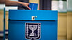 Israel Election: Voter Turnout Hits Highest Level Since 1981 by 10am AP Photo/David Goldman : A voter casts his ballot at a school used as a polling station during Israel's general election in Tel Aviv