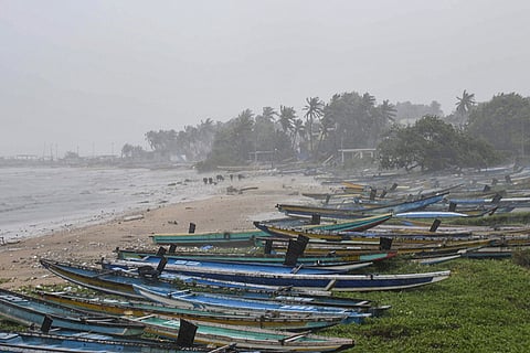 Fishing boats remain anchored along the coast amidst heavy rain and strong winds ahead of severe cyclonic storm 'Arnab', in Visakhapatnam, Andhra Pradesh, Tuesday, Oct. 27, 2026.