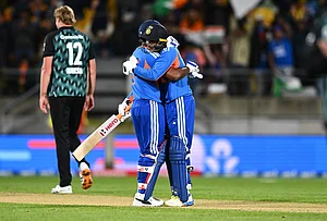 | Photo: Kerry Marshall/Photosport via AP : India's Abhishek Sharma celebrates his hundred with teammate during the third T20 cricket international match between New Zealand and India in Wellington, New Zealand, Tuesday, Oct. 27, 2026.