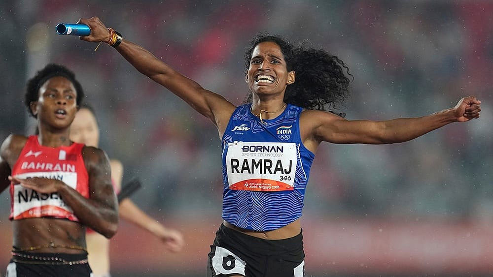 India' s Vithya Ramraj reacts as she crosses the finish line in the women's 4 x 400m relay final at the Asian Games in Nagoya, Japan, Tuesday, Sept. 29, 2026. 
 - | Photo: AP/Lee Jin-man