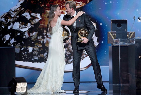 England's soccer player Harry Kane and Spain's Alexia Putellas win the player of the year trophy during the Ballon d'Or ceremony at the London Palladium Theatre in London, England, Monday, Oct. 26, 2026. 