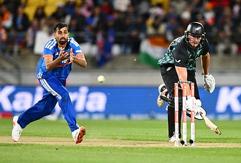 New Zealand's Bevon Jacobs makes his ground as India's Prince Yadav attempts to run him out during the third T20 international cricket match between New Zealand and India in Wellington, New Zealand, Tuesday, Oct. 27, 2026. 
