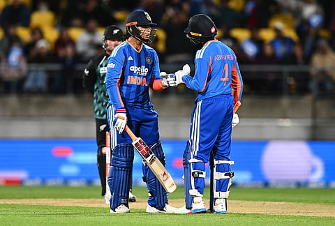 India's Vaibhav Sooryavanshi, left, and teammate Abhishek Sharma gesture during the third T20 cricket international match between New Zealand and India in Wellington, New Zealand, Tuesday, Oct. 27, 2026. 