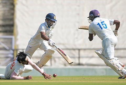 Goa’s Yash Kasvankar, left, and Vasuki Koushik run between the wickets on day two of the Ranji Trophy Elite Group A cricket match between Vidarbha and Goa, in Nagpur.