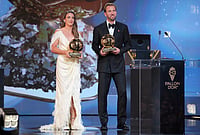 | Photo: AP/Kin Cheung : England's soccer player Harry Kane and Spain's Alexia Putellas win the player of the year trophy during the Ballon d'Or ceremony at the London Palladium Theatre in London, England, Monday, Oct. 26, 2026. 