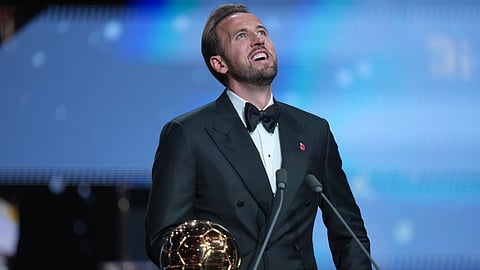 England's soccer player Harry Kane wins the player of the year trophy during the Ballon d'Or ceremony at the London Palladium Theatre in London, England, Monday, Oct. 26, 2026 