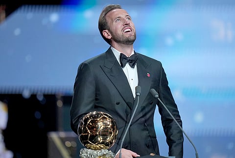 England's soccer player Harry Kane wins the player of the year trophy during the Ballon d'Or ceremony at the London Palladium Theatre in London, England, Monday, Oct. 26, 2026.