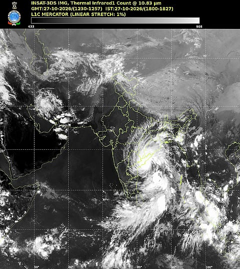In this image released on Oct. 27, 2026, INSAT-3DS satellite image by the India Meteorological Department (IMD) shows the cyclone 'Arnab' over the west-central Bay of Bengal, captured at 1800-1827 IST. The storm is forecast to make landfall along the Andhra Pradesh coast between Bapatla and Visakhapatnam, near Yanam, with wind speeds reaching up to 135 kmph.