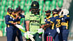 | Photo: AP : Shadab Khan goes back to the pavilion after being dismissed 