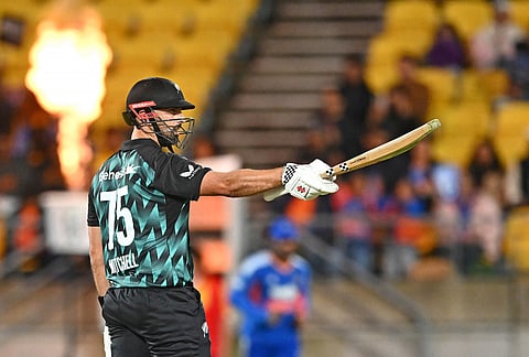 New Zealand's Daryl Mitchell celebrates scoring 50 runs during the third T20 cricket international match between New Zealand and India in Wellington, New Zealand, Tuesday, Oct. 27, 2026.