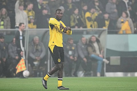 Dortmund's Serhou Guirassy celebrates after scoring a goal during the German soccer cup match between Borussia Dortmund and Werder Bremen in Dortmund, Germany, Tuesday, Oct. 27, 2026.