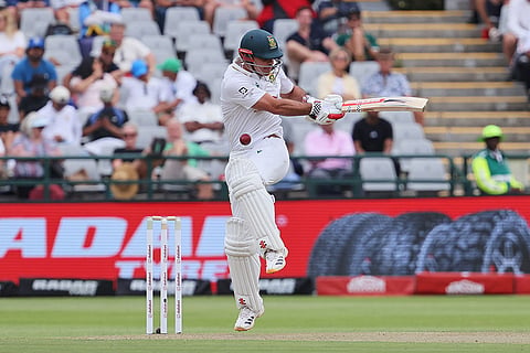 South Africa's David Bedingham is hit by the ball on day one of the third cricket test match between South Africa and Australia in Cape Town, South Africa, Tuesday, Oct. 27, 2026.