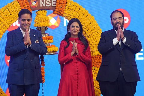 Akash Ambani, left, chairman of Reliance Jio Infocomm Ltd., Isha Ambani, center, a non-executive director of Jio Platforms Ltd., and Anant Ambani, non-executive director of Jio Platforms Ltd., attend the initial public offering (IPO) listing ceremony of Reliance Industries' Jio Platforms at the National Stock Exchange (NSE) in Mumbai, India, Wednesday, Oct. 28, 2026.