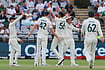 Mitchell Starc Shines As Australia Fight Back After South Africa's Strong Start | Photo: AP/Halden Krog : Australia's Mitchell Starc, center, celebrates with teammates the wicket of South Africa's Marco Jansen on day one of the third cricket test match between South Africa and Australia in Cape Town, South Africa, Tuesday, Oct. 27, 2026.