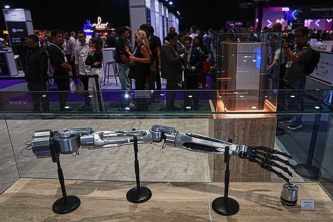A robotic arm is displayed in a glass case at the Dubai AI Festival in Dubai, United Arab Emirates, Tuesday, Oct. 27, 2026.