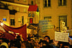 | Photo: AP/Armando Franca : A protester carries a cardboard house with a "For Rent" sign during a demonstration demanding affordable housing outside Portugal's Parliament in Lisbon, Tuesday night, Oct. 27, 2026. 
