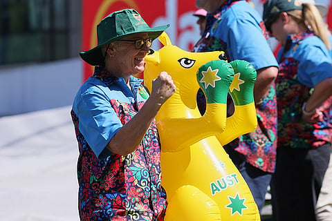 An Australian fan cheers on day one of the third cricket test match between South Africa and Australia in Cape Town, South Africa, Tuesday, Oct. 27, 2026.