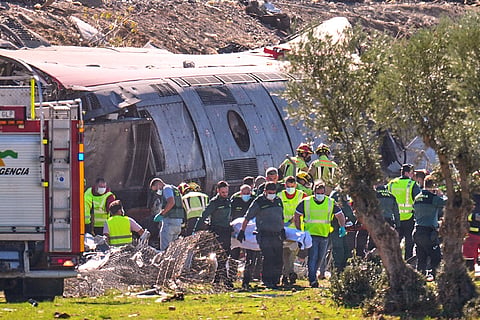 Emergency services attend to the victims at the scene of a collision between two trains in Urda, Spain, on Wednesday, Oct. 28, 2026.