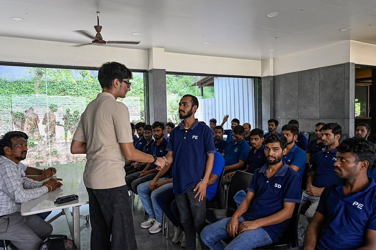 People attending a training session in a meeting room.